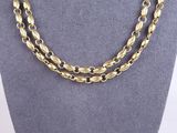 a gold chain necklace on a mannequin mannequin mannequin mannequin mannequin mannequin mannequin mannequin manne