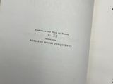 an open book with a black and white picture of a bird on it