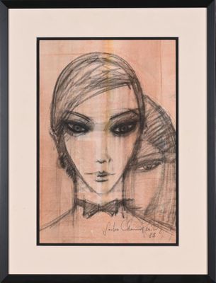 une image représentant le dessin du visage d'une femme dans un cadre noir