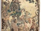 une image représentant une tapisserie sur laquelle figure un homme à cheval