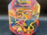 a close up of a box of pokemon trading cards on a table