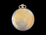 an image of a close up of a pocket watch on a black background