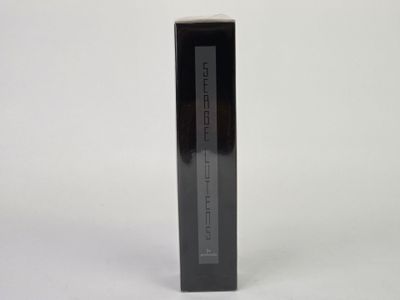 an empty black box on a white surface with a white background