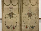 pair of antique embroidered panels with a portrait of a man and a woman