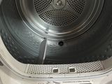 an image of a washer with the door open