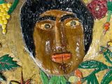 a painting of a man that is on the wall