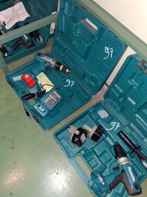 two blue tools in the case on the floor