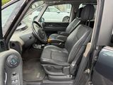 a picture of the interior of a car with the door open
