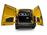 the back end of a yellow van with its doors open