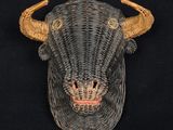 an image of a wicker bull head on a black background
