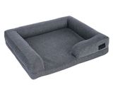 un panier pour chien gris surmonté d'un grand coussin