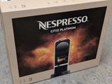 a box of nespresso citiz platinum coffee machines on the ground