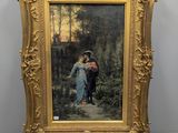a painting of a woman holding a child in a gold frame
