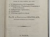 an open book on a table with a black and white title