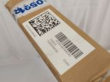 a close up of a cardboard box with a barcode on it