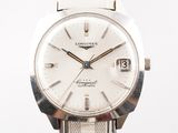 an image of a longines watch with a white dial and a silver bracelet