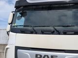 a picture of a white truck parked on the side of the road