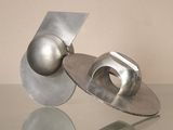 a metal object that is sitting on a glass table