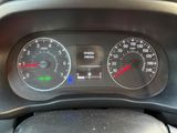 a close up of a car dashboard with a speedometer and gauges