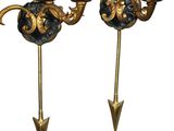 pair of antique brass wall sconces with black and gold accents
