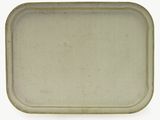 a close up of a tray on a white surface