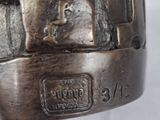 a close up of a metal object on a table