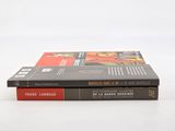 two books that are stacked on top of each other