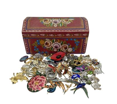 a red box with many different types of jewelry in it