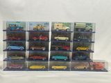 a lot of toy cars that are in a display case