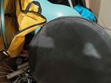 a bike with a bag on the back of it