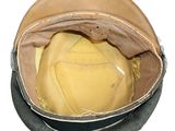 an image of a leather hat with a hole in it