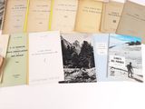 a lot of books that are sitting on a table