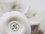 a close up of a tea cup and saucer on a table