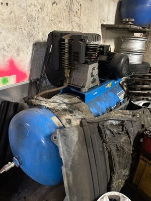 an image of a room that has a bunch of items on the floor