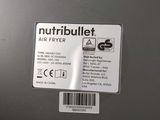 a close up of the nutribullet air fryer label on the side of it