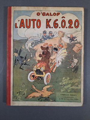 un vieil album de bandes dessinées avec l'image d'une souris au volant d'une voiture