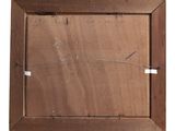 an old wooden picture frame with a piece of paper taped to it