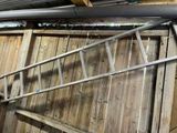 a ladder that is hanging from the ceiling of a building