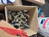 a box full of toothbrushes and toothpaste in it