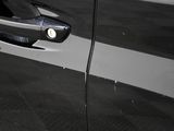 a close up of a door handle on a car