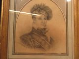 portrait of a man in a military uniform in a gold frame