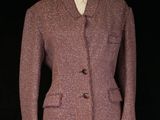 an image of a pink jacket on a mannequin stand