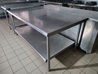 1 table en inox avec tablette d'entretoise (200x100cm) (photo 2)