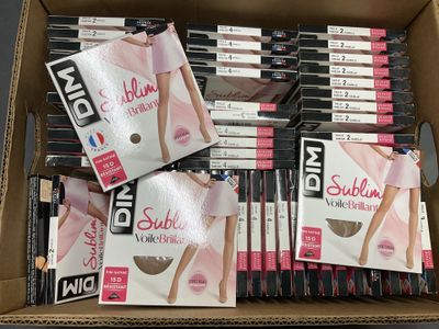 a box of assorted makeup products on display in a store