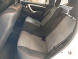 the interior of a car with two seats and a steering wheel