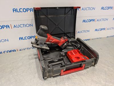 a tool box with tools inside of it sitting on the floor