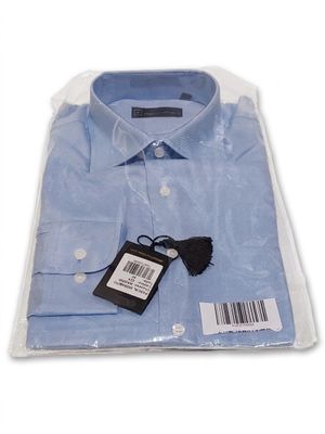 the shirt has a tag on it and a tag is attached to it