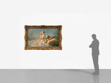 an image of a man standing in front of a painting