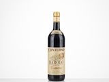 a close up of a bottle of wine on a table