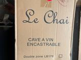 a box of wine that is sitting on the ground